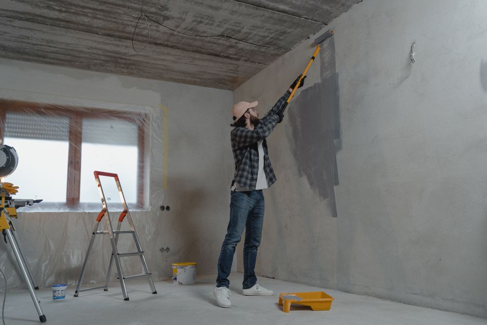 Professional cleaner working on a kitchen surface